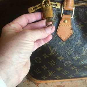 Authentic Louis Vuitton Alma Handbag